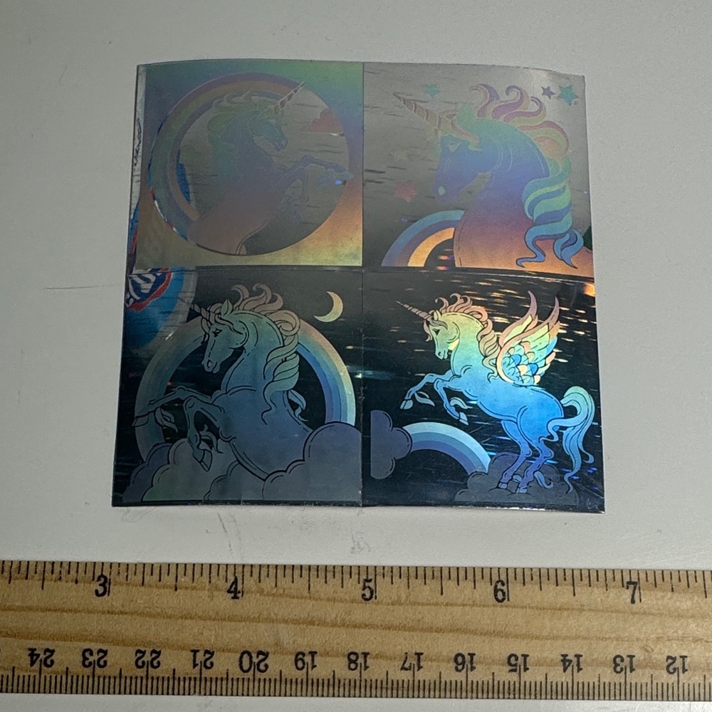 vintage 1980s  hologram stickers featuring unicorn and pegasus designs